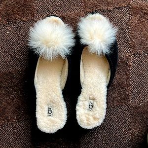 UGG flats, original lamb wool, black with tufts, never worn.